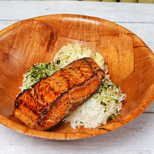Grilled salmon with rice and macaroni salad in a wooden bowl from OverRice.